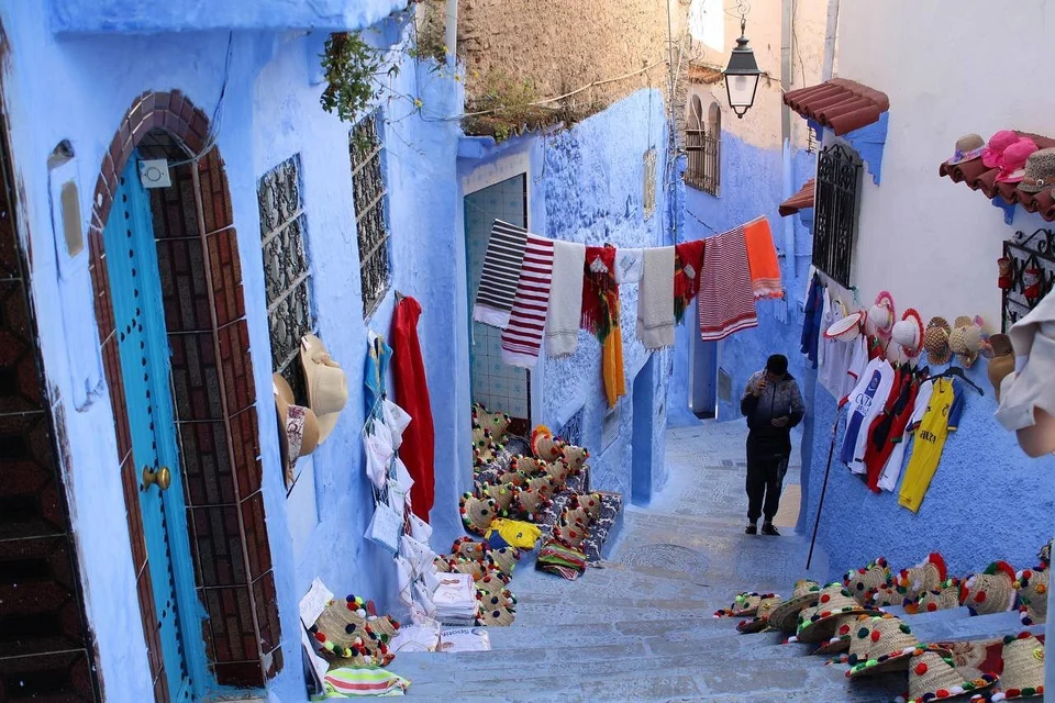 Blue-painted street and local crafts in Chefchaouen