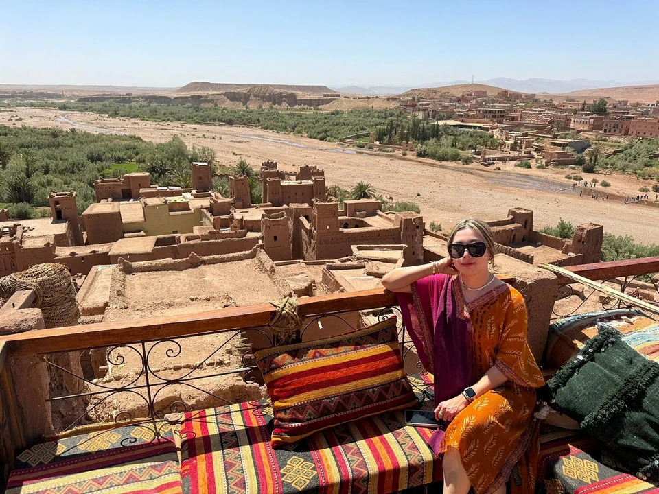 Traveler overlooking a historic kasbah village during a ten-day Morocco trip