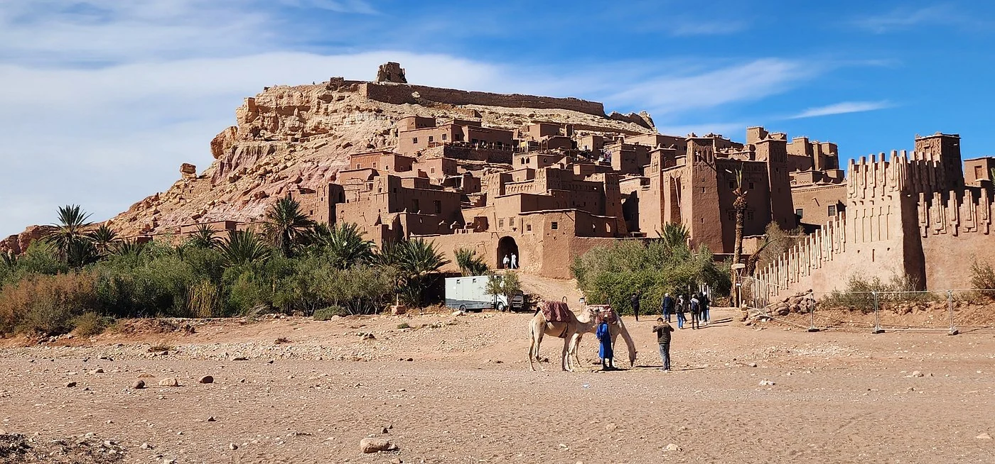 Ait Ben Haddou kasbah and palm trees on a day trip from Marrakech